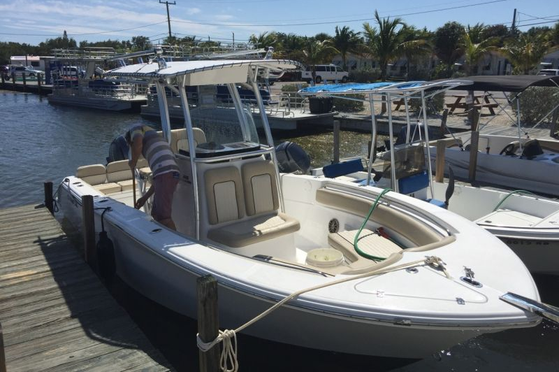 Center Console Boat in dock Photo